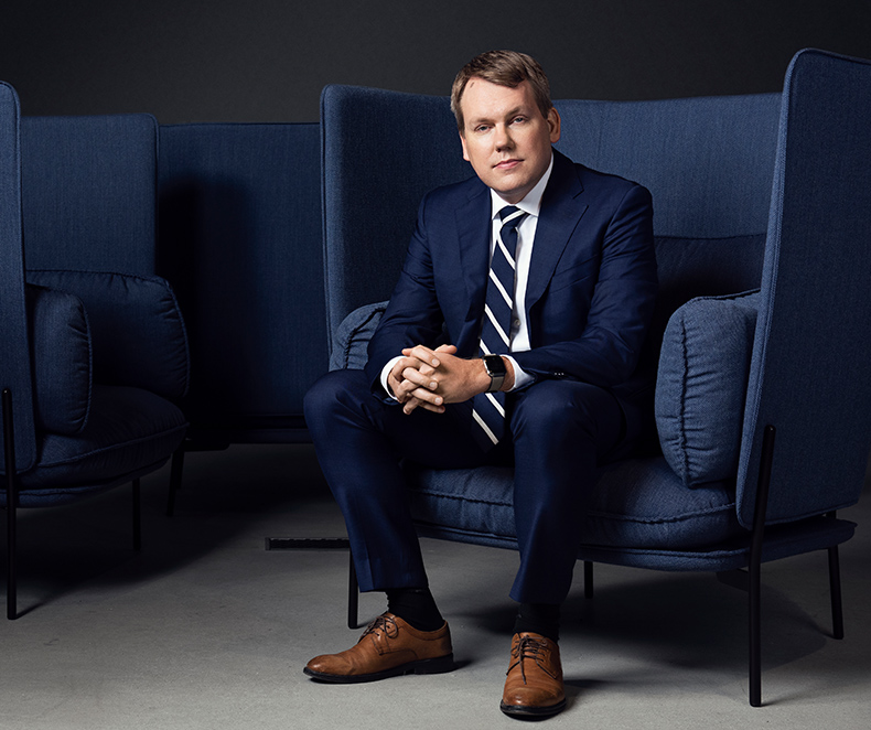 Stefan Widing, President and CEO, sitting in an armchair. (photo)