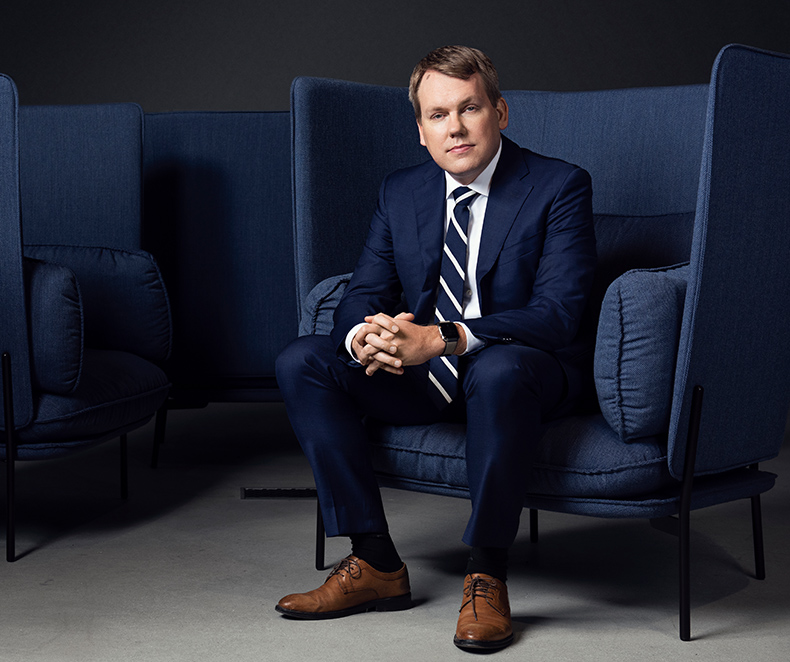Stefan Widing, President and CEO, sitting in an armchair. (photo)