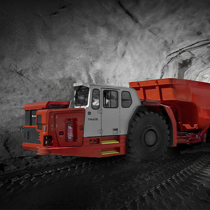 Sandvik® TH665B battery-electric truck in an underground environment. (photo)