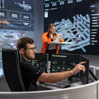 Engineers in the control room of the Sandvik test mine in Tampere (Finland) (photo)