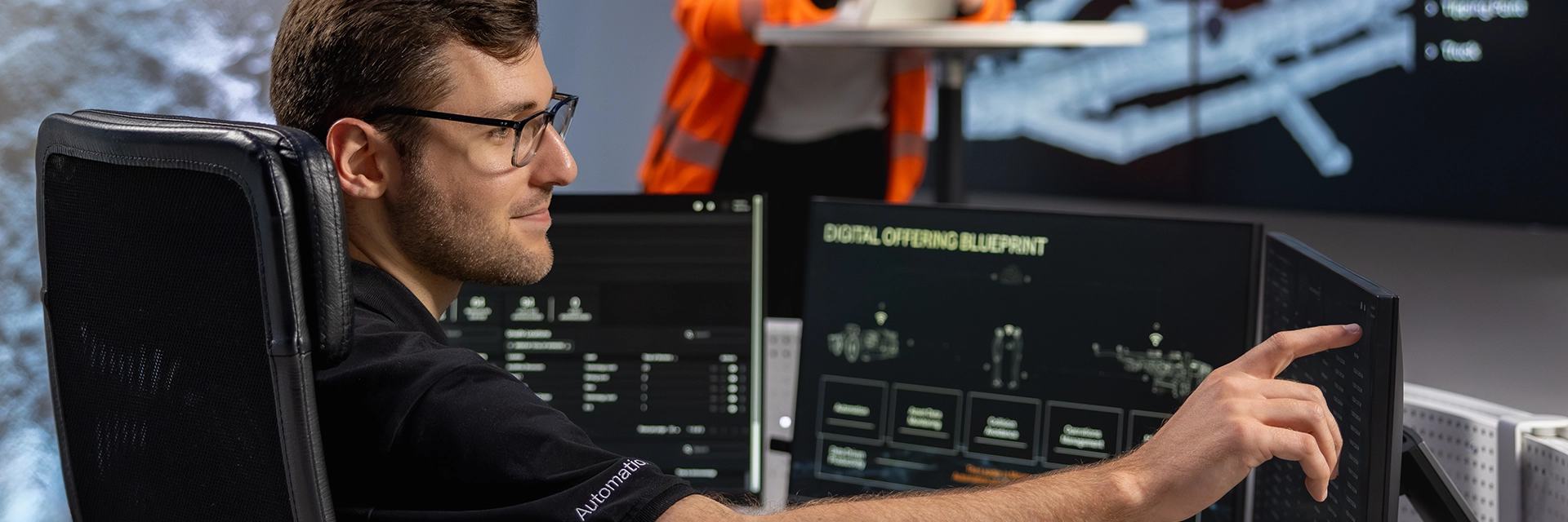 Engineers in the control room of the Sandvik test mine in Tampere (Finland) (photo)